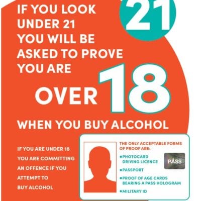 Challenge 21 poster: if you look under 21, you must prove you're over 18 to buy alcohol. Acceptable ID: photocard driving licence, passport, PASS-hologram proof of age cards, or military ID. Buying underage is an offence. challenge21.pub, BBPA logo